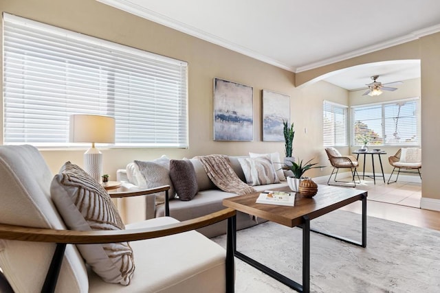 1361 Felspar St Unit 7, San Diego, CA 92109 - living room featuring crown molding, arched walkways, and a ceiling fan