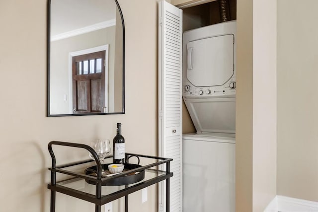 1361 Felspar St Unit 7, San Diego, CA 92109 - laundry room with stacked washer / drying machine and ornamental molding