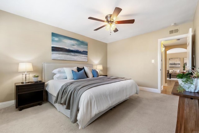 1361 Felspar St Unit 7, San Diego, CA 92109 - bedroom featuring arched walkways, light carpet, and ceiling fan