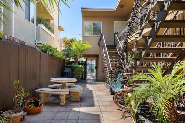 1361 Felspar St Unit 7, San Diego, CA 92109 - view of patio / terrace featuring stairs