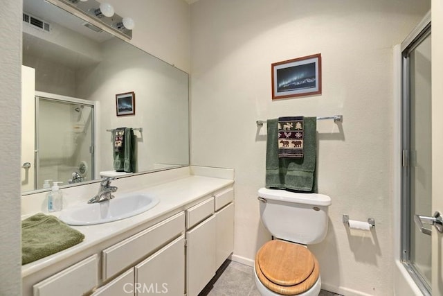 2823 W W Ave K12, Unit 136, Lancaster, CA 93536 - bathroom featuring a shower with door, vanity, and tile patterned flooring