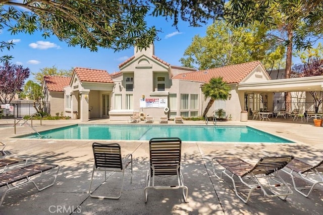 2823 W W Ave K12, Unit 136, Lancaster, CA 93536 - community pool featuring a patio area