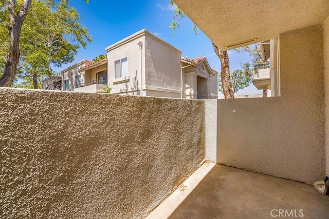 2823 W W Ave K12, Unit 136, Lancaster, CA 93536 - view of property exterior with stucco siding