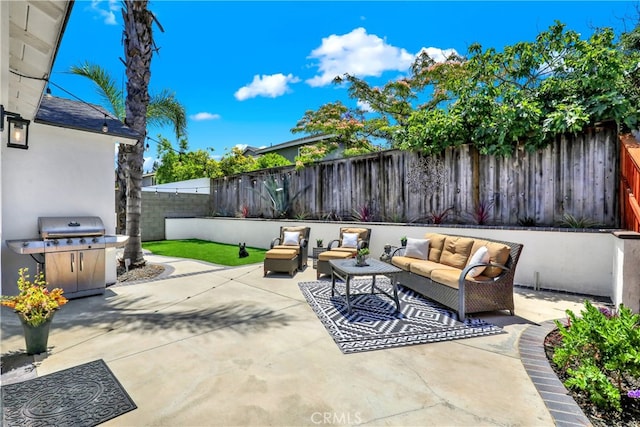 27322 Eastridge Dr, Lake Forest, CA 92630 - fenced backyard featuring an outdoor living space, a grill, and a patio area
