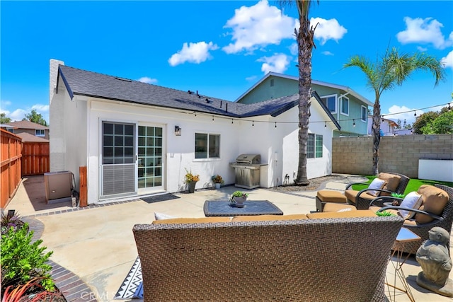 27322 Eastridge Dr, Lake Forest, CA 92630 - rear view of property featuring stucco siding and a patio area
