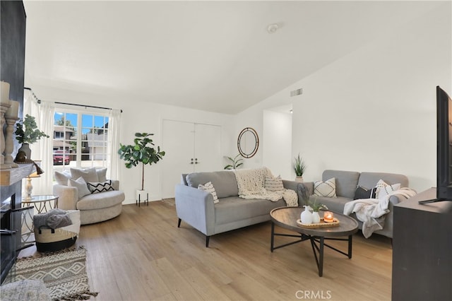 27322 Eastridge Dr, Lake Forest, CA 92630 - living room with light wood-style flooring and vaulted ceiling