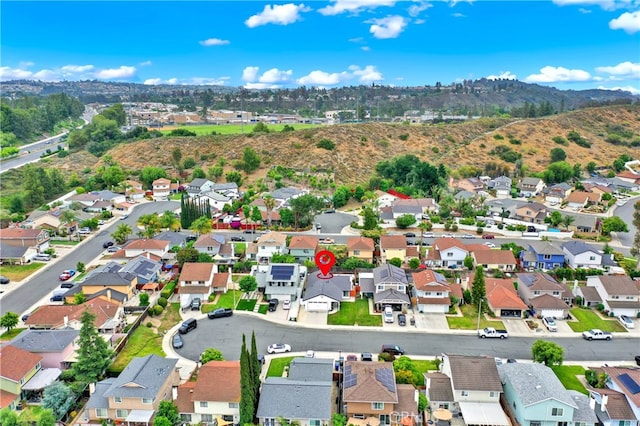 27322 Eastridge Dr, Lake Forest, CA 92630 - aerial overview of property's location with nearby suburban area and a mountainous background