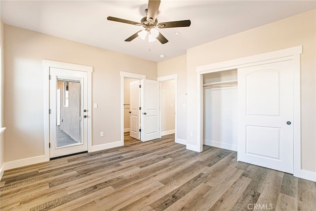 836 Regnier Ln, Paradise, CA 95969 - unfurnished bedroom with light wood finished floors, a closet, and ceiling fan