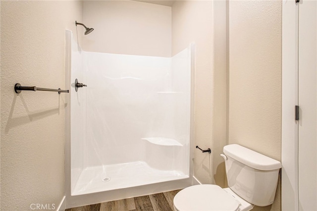 836 Regnier Ln, Paradise, CA 95969 - bathroom featuring wood finished floors, a shower, and a textured wall