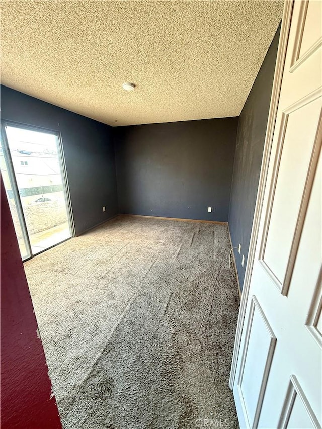 4043 Utah St Unit 8, San Diego, CA 92104 - carpeted empty room with a textured ceiling