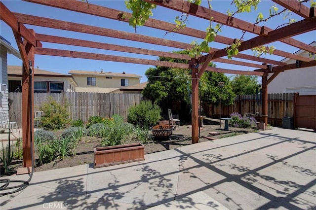 571 W 17th St, San Pedro, CA 90731 - fenced backyard with an outdoor fire pit, a patio, and a pergola