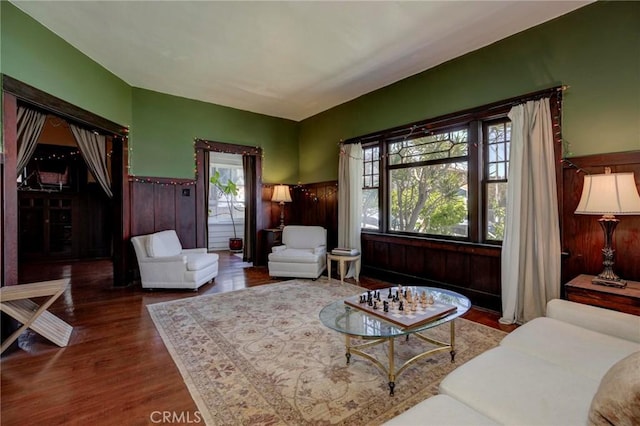 571 W 17th St, San Pedro, CA 90731 - living area with wainscoting, wood finished floors, and wood walls