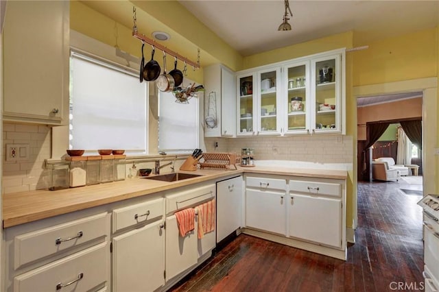571 W 17th St, San Pedro, CA 90731 - kitchen featuring white dishwasher, backsplash, dark wood-style floors, and glass insert cabinets