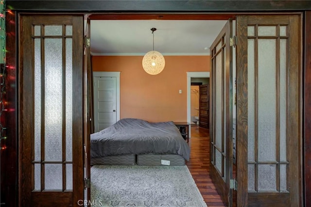 571 W 17th St, San Pedro, CA 90731 - bedroom with dark wood finished floors and crown molding