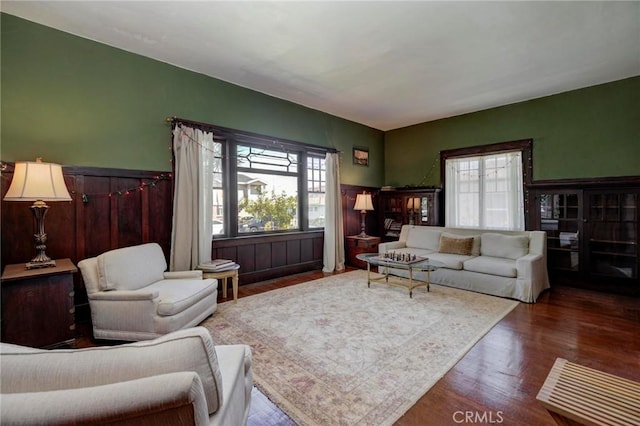 571 W 17th St, San Pedro, CA 90731 - living room featuring a wainscoted wall and wood finished floors