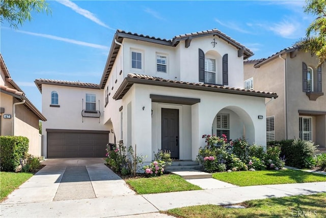49 Eaglecreek, Irvine, CA 92618 - mediterranean / spanish house featuring stucco siding, an attached garage, a tiled roof, and concrete driveway