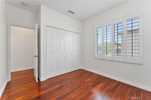 49 Eaglecreek, Irvine, CA 92618 - unfurnished bedroom with wood finished floors and a closet