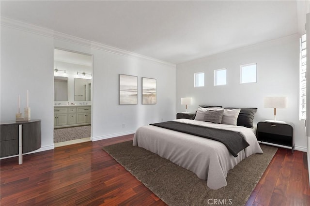 49 Eaglecreek, Irvine, CA 92618 - bedroom with dark wood-style floors, crown molding, and ensuite bath