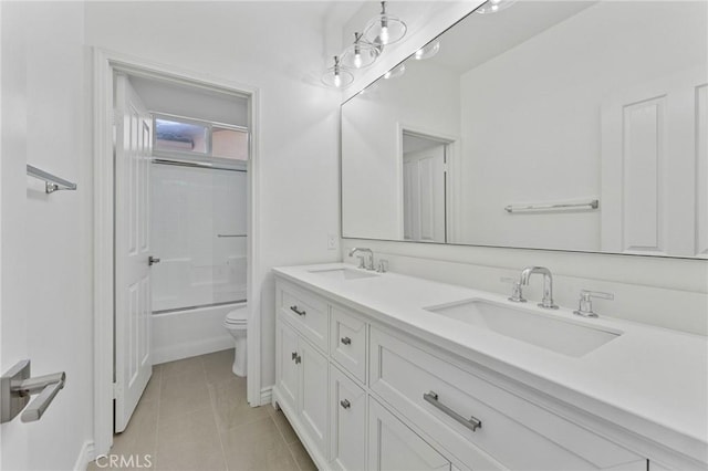 49 Eaglecreek, Irvine, CA 92618 - full bath featuring double vanity, combined bath / shower with glass door, and tile patterned floors