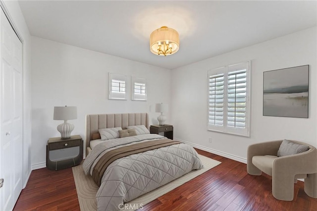 49 Eaglecreek, Irvine, CA 92618 - bedroom featuring wood finished floors, a chandelier, and a closet