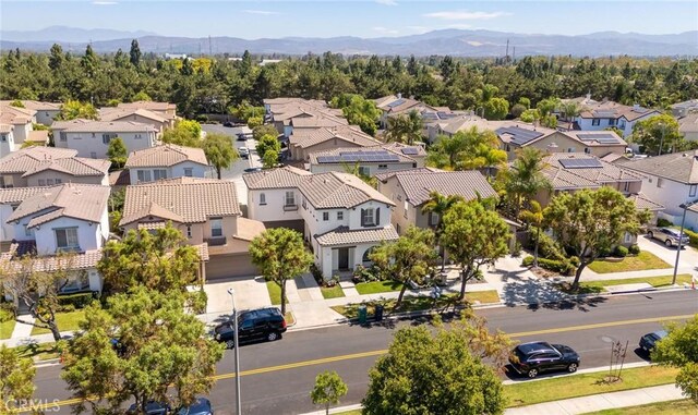 49 Eaglecreek, Irvine, CA 92618 - aerial view of residential area featuring a mountain backdrop