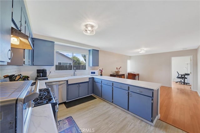 3966 Laurel Ct, Chino Hills, CA 91709 - kitchen with blue cabinets, stainless steel appliances, and a peninsula