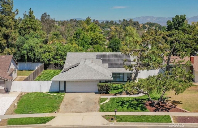3966 Laurel Ct, Chino Hills, CA 91709 - view of front of home with solar panels, concrete driveway, and an attached garage