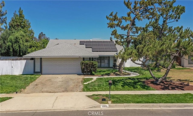 3966 Laurel Ct, Chino Hills, CA 91709 - view of front of house with a garage, roof mounted solar panels, driveway, and roof with shingles
