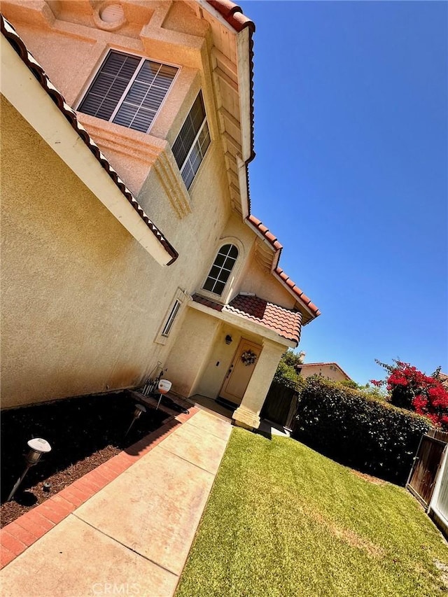 13067 Winterpark Way, Riverside, CA 92503 - view of front facade featuring stucco siding and a tiled roof
