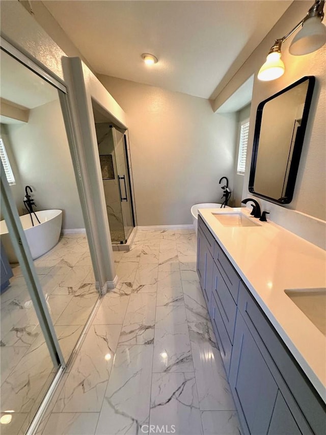13067 Winterpark Way, Riverside, CA 92503 - full bath with a marble finish shower, marble finish flooring, double vanity, and a freestanding tub