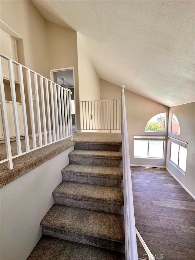 13067 Winterpark Way, Riverside, CA 92503 - staircase with vaulted ceiling and wood finished floors