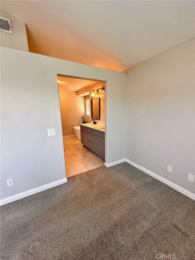 13067 Winterpark Way, Riverside, CA 92503 - spare room featuring baseboards and light carpet