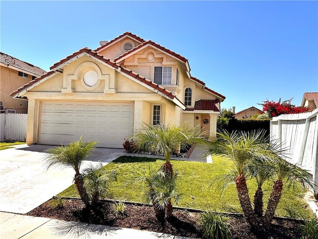 13067 Winterpark Way, Riverside, CA 92503 - mediterranean / spanish-style house featuring a tiled roof, stucco siding, concrete driveway, and a garage