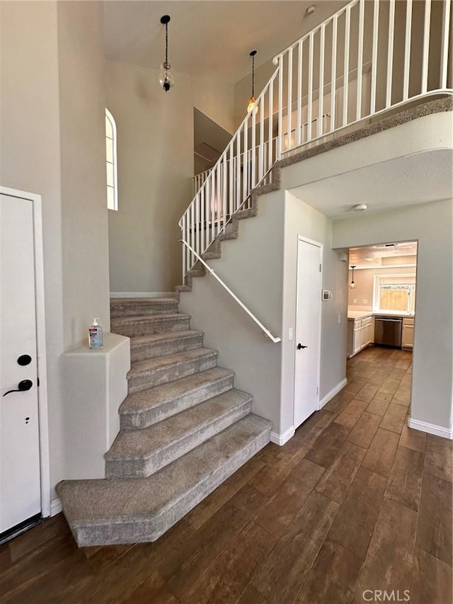 13067 Winterpark Way, Riverside, CA 92503 - stairway with wood finished floors and a high ceiling