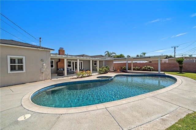 9662 Crosby Ave, Garden Grove, CA 92844 - view of pool featuring a pergola, a patio area, and a pool with connected hot tub