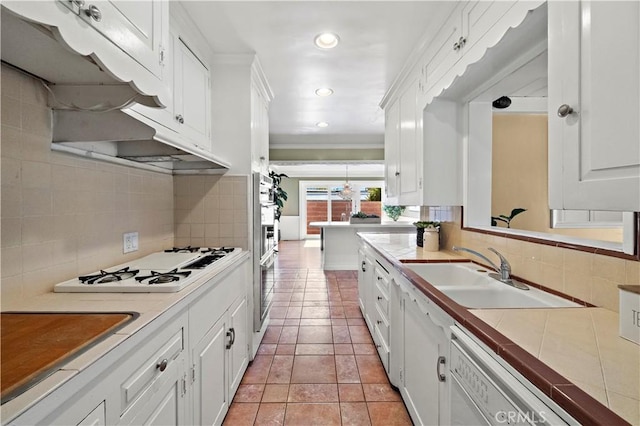 9662 Crosby Ave, Garden Grove, CA 92844 - kitchen featuring white appliances, white cabinets, backsplash, and recessed lighting