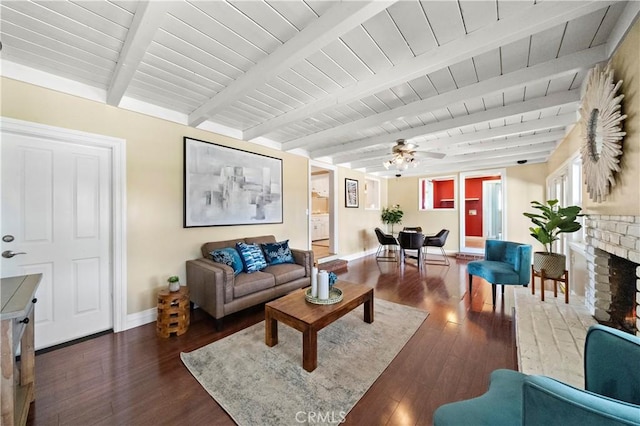 9662 Crosby Ave, Garden Grove, CA 92844 - living area with dark wood-style floors, a wood ceiling with exposed beams, a brick fireplace, and a ceiling fan