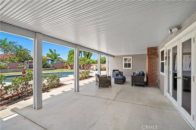 9662 Crosby Ave, Garden Grove, CA 92844 - fenced backyard featuring a patio area, an outdoor living space, and french doors