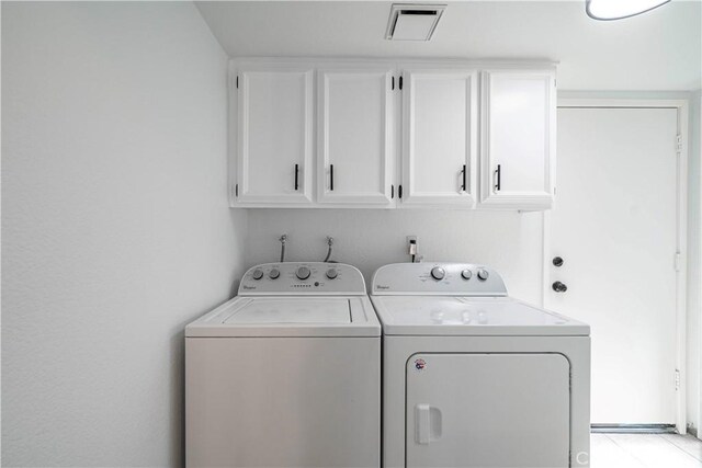 1440 Amanda Pl, Upland, CA 91784 - laundry area featuring cabinet space and washer and dryer