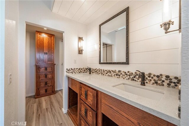 1440 Amanda Pl, Upland, CA 91784 - full bathroom with wood finished floors and double vanity