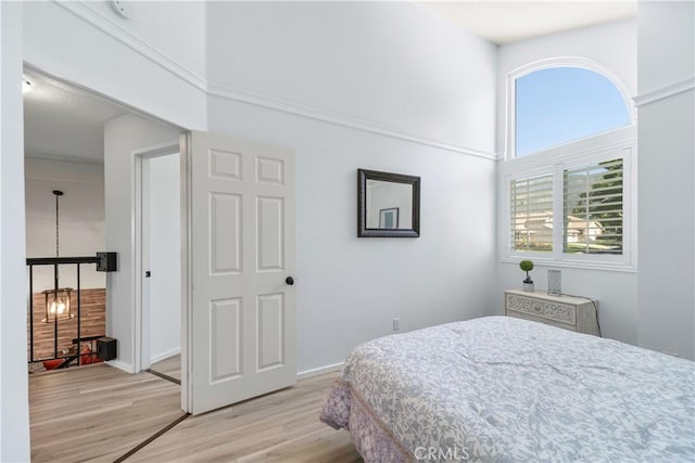 1440 Amanda Pl, Upland, CA 91784 - bedroom featuring a high ceiling and light wood finished floors