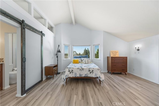 1440 Amanda Pl, Upland, CA 91784 - bedroom featuring beamed ceiling, a barn door, light wood-style floors, high vaulted ceiling, and ensuite bathroom