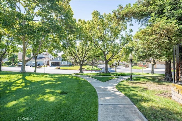 1440 Amanda Pl, Upland, CA 91784 - view of home's community with a lawn