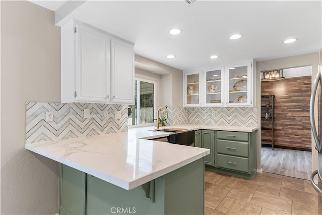 1440 Amanda Pl, Upland, CA 91784 - kitchen featuring green cabinetry, white cabinets, a peninsula, tasteful backsplash, and recessed lighting