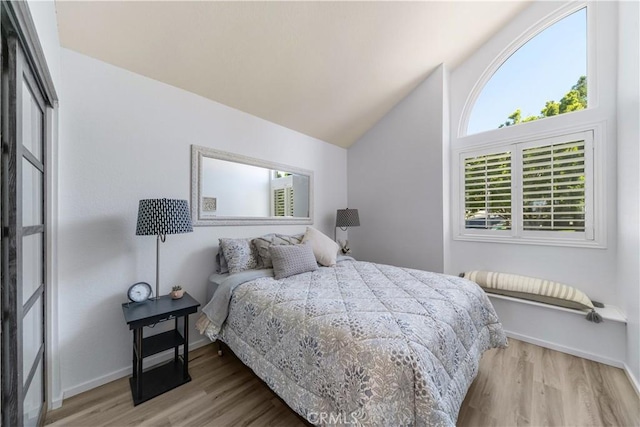 1440 Amanda Pl, Upland, CA 91784 - bedroom with wood finished floors and lofted ceiling