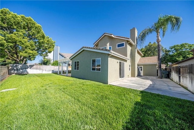1440 Amanda Pl, Upland, CA 91784 - rear view of property with a patio area, stucco siding, a chimney, and a fenced backyard