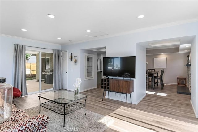 1440 Amanda Pl, Upland, CA 91784 - living area featuring attic access, ornamental molding, wood finished floors, and recessed lighting
