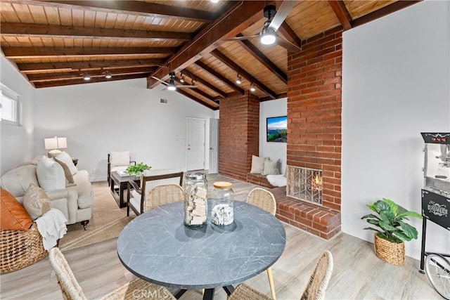 4802 Brookway Ave, Yorba Linda, CA 92886 - dining area with a ceiling fan, wooden ceiling, light wood-style floors, and a brick fireplace
