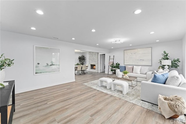 4802 Brookway Ave, Yorba Linda, CA 92886 - living room with recessed lighting, wood finished floors, and a fireplace