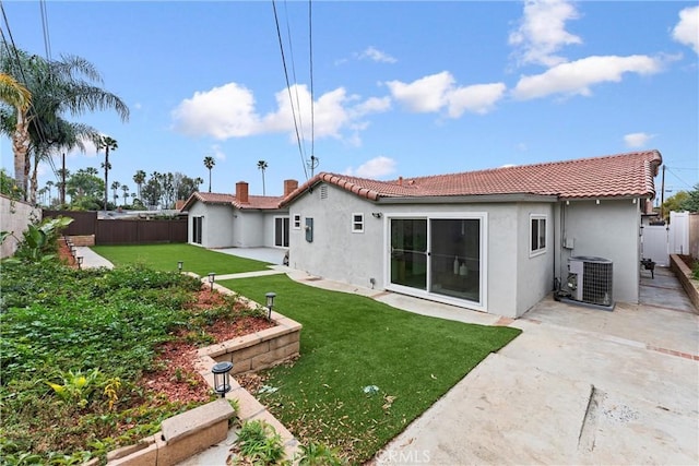 4802 Brookway Ave, Yorba Linda, CA 92886 - back of house with a tiled roof, stucco siding, a fenced backyard, and a patio area